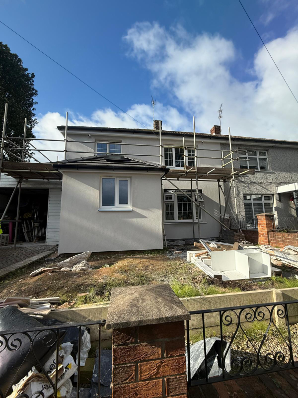 E W I render system to a concrete pour system home with no cavity